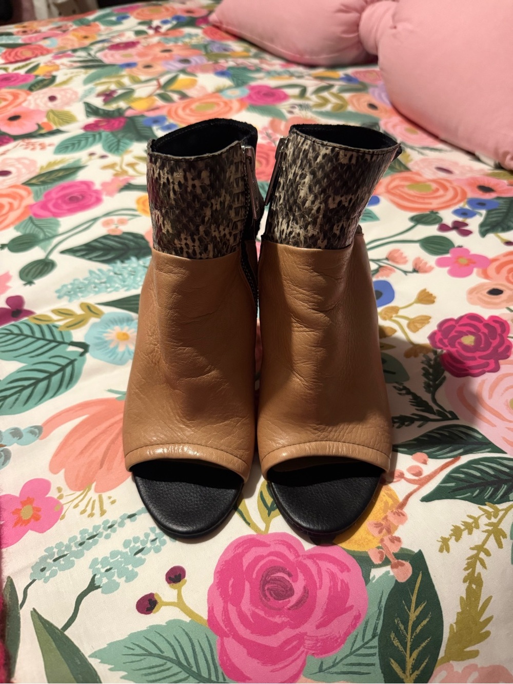 Women’s Tan Peep-Toe Ankle Booties with snakeskin trim.